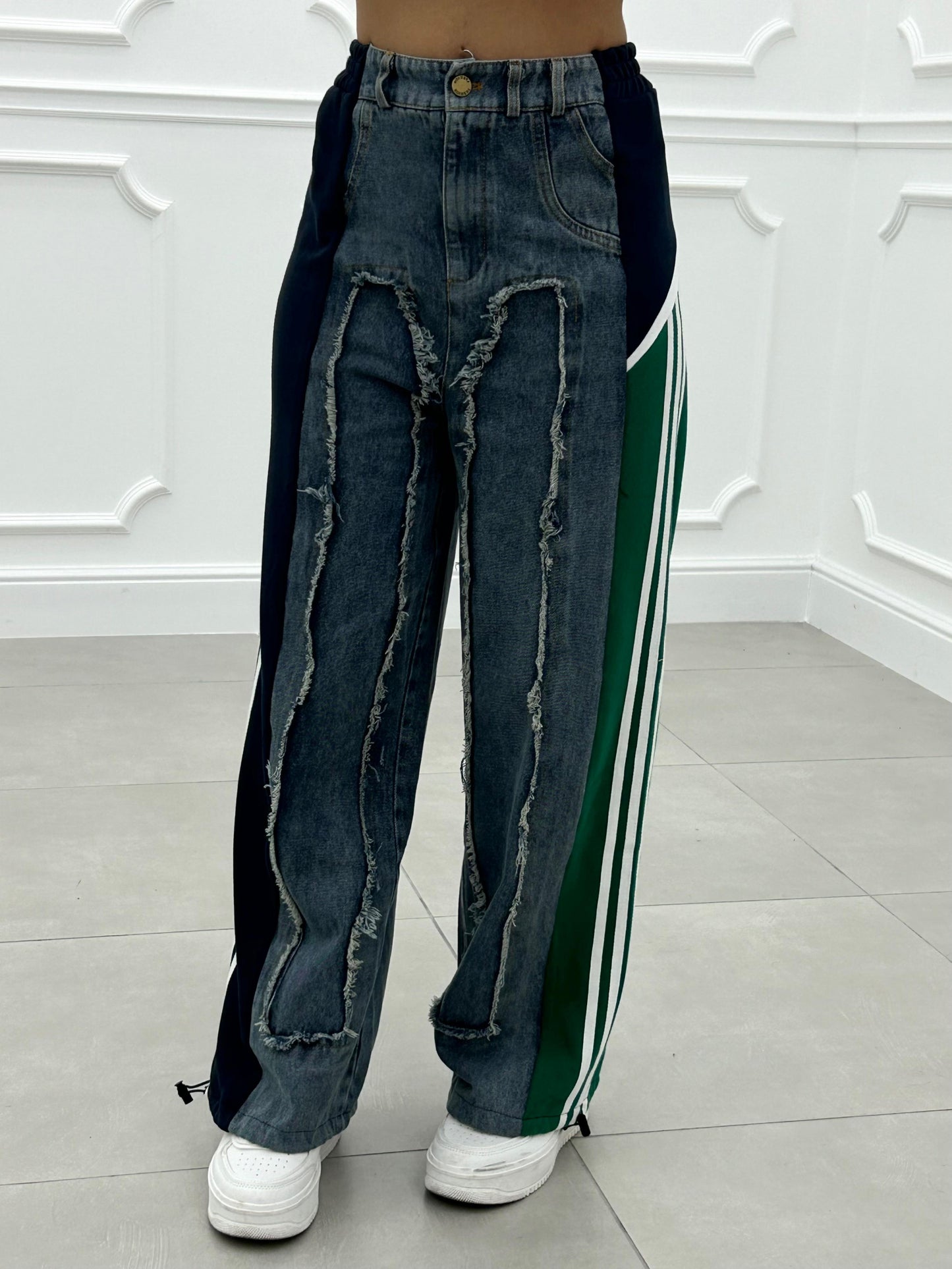 JEANS CON PROFILI IN TUTA