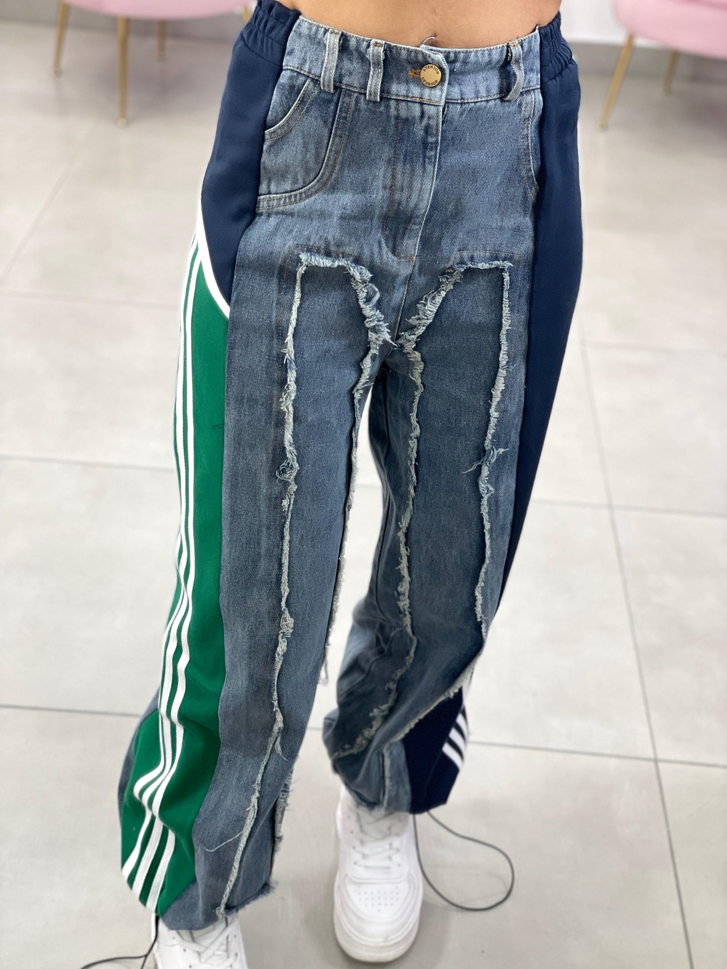 JEANS CON PROFILI IN TUTA