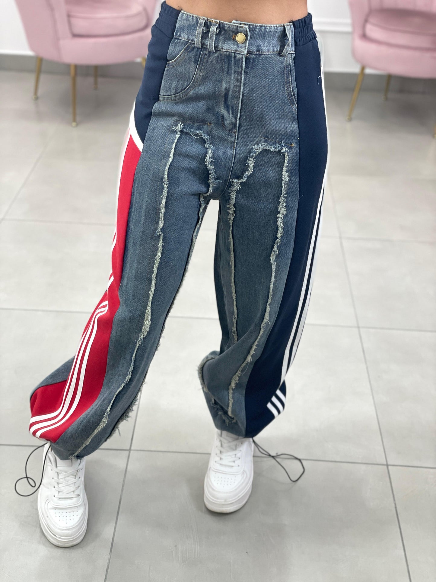 JEANS CON PROFILI IN TUTA
