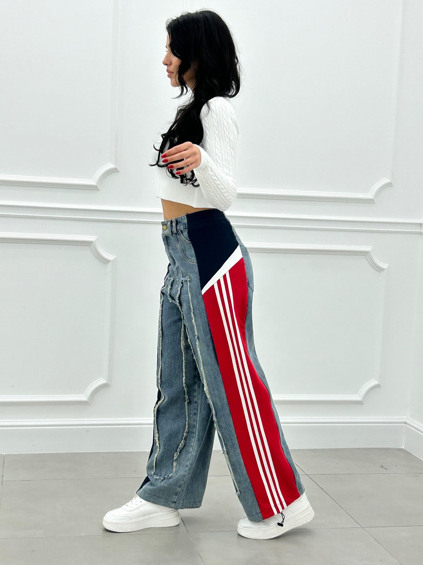 JEANS CON PROFILI IN TUTA