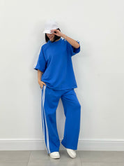 COORDINATO TUTA CON PROFILI LATERALI NEW SS25