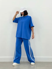 COORDINATO TUTA CON PROFILI LATERALI NEW SS25
