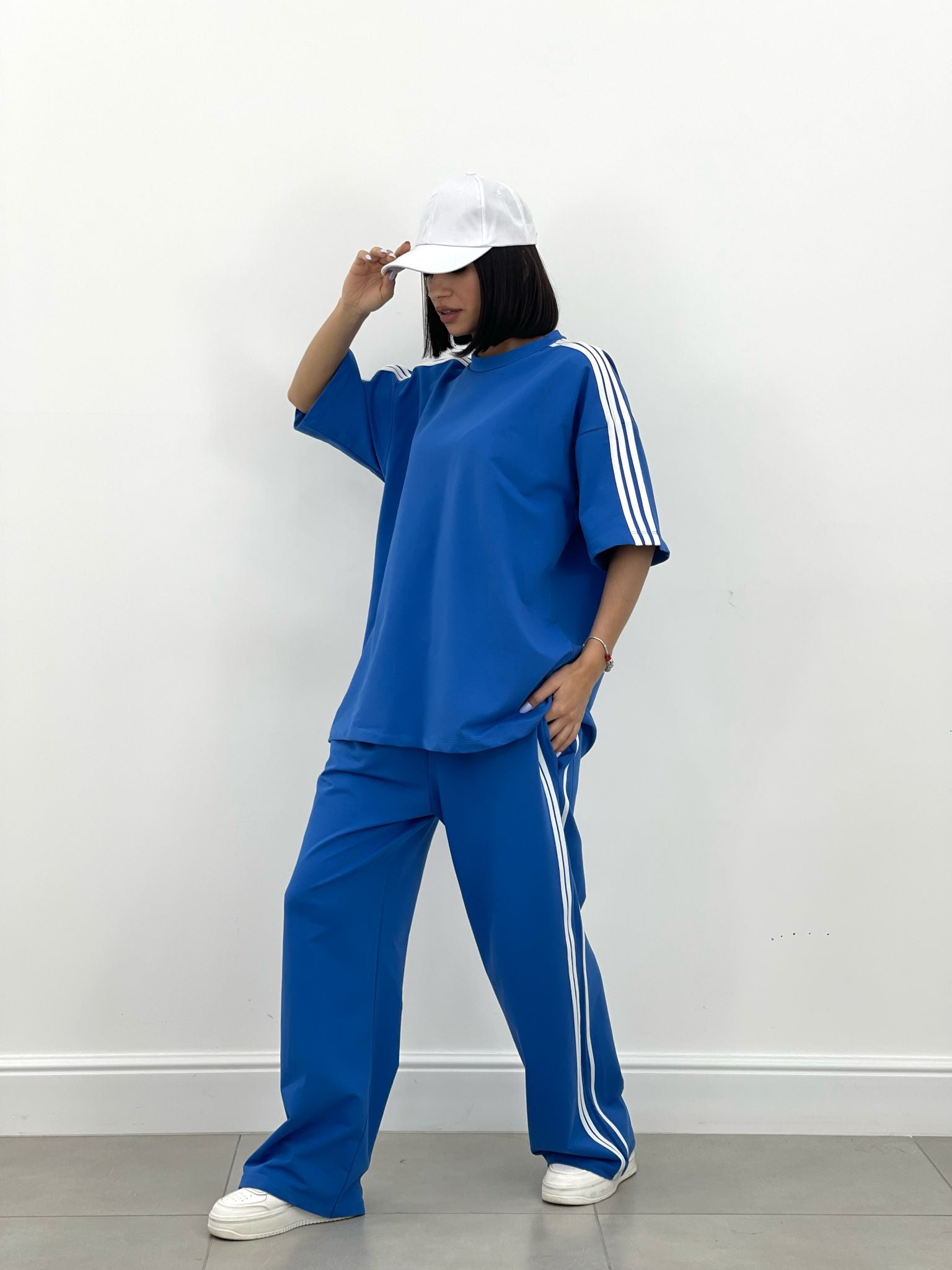 COORDINATO TUTA CON PROFILI LATERALI NEW SS25