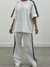 COORDINATO TUTA CON PROFILI LATERALI NEW SS25