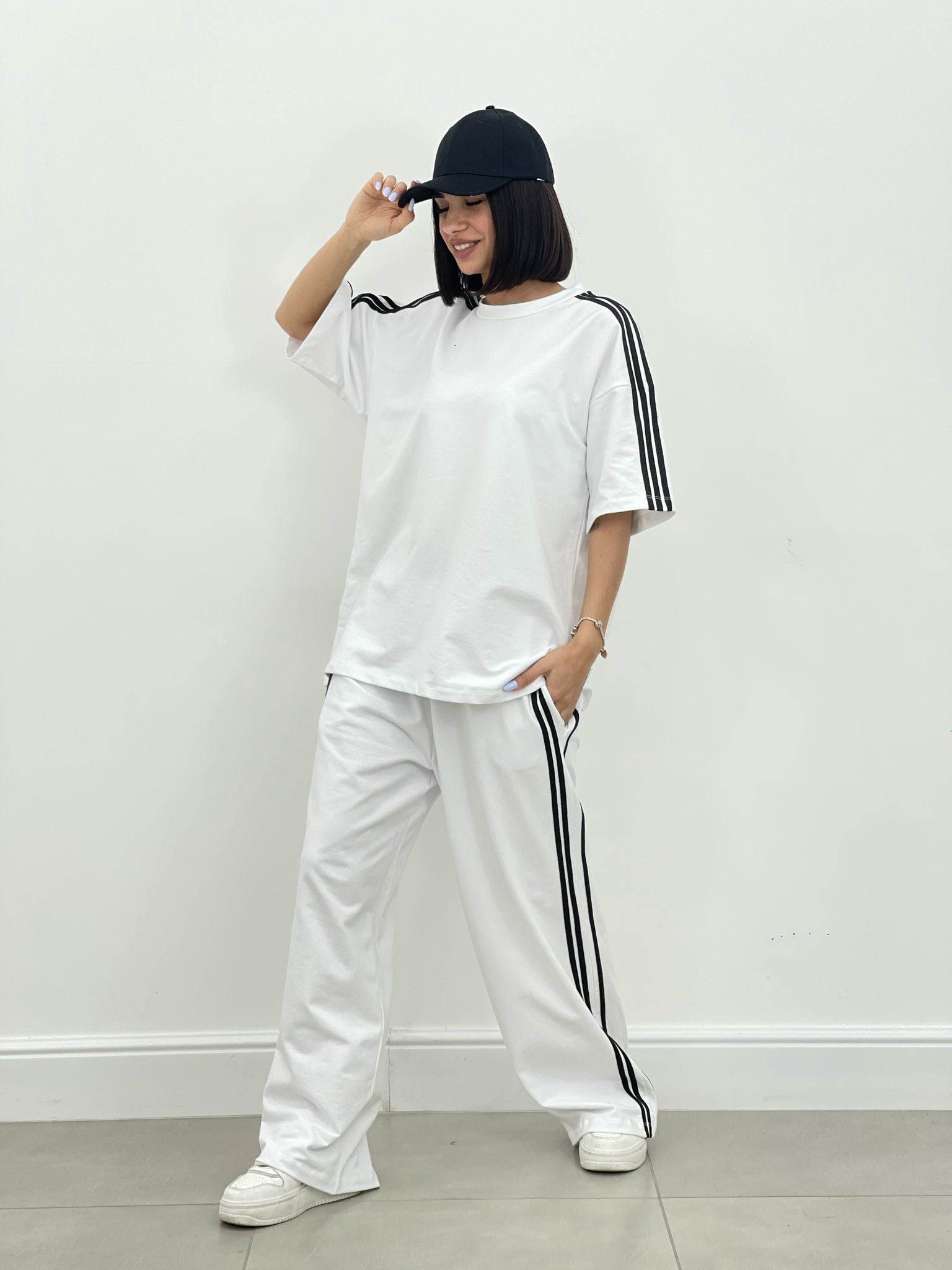 COORDINATO TUTA CON PROFILI LATERALI NEW SS25