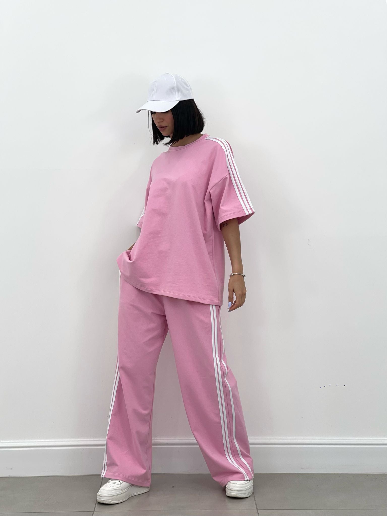 COORDINATO TUTA CON PROFILI LATERALI NEW SS25