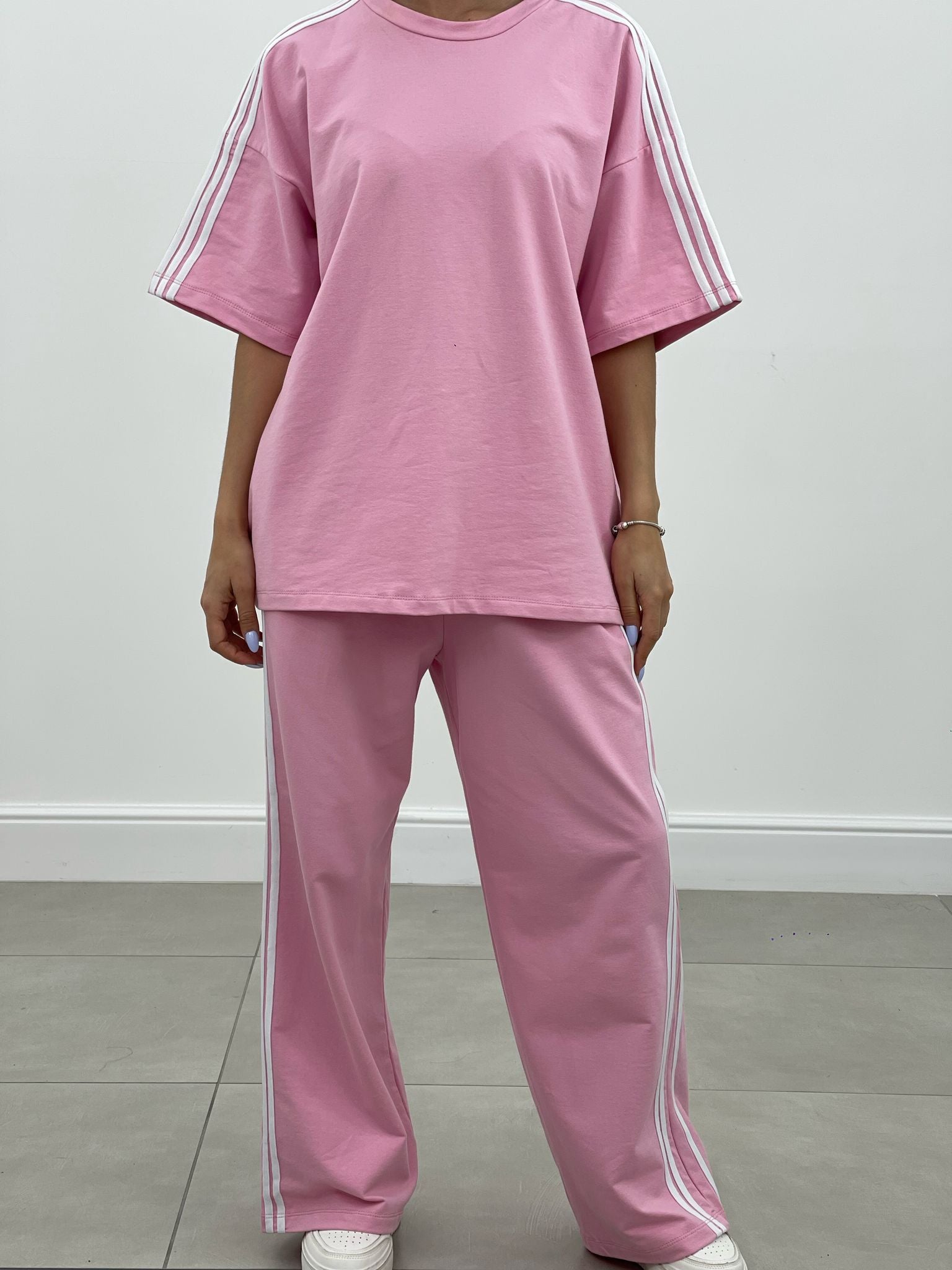 COORDINATO TUTA CON PROFILI LATERALI NEW SS25
