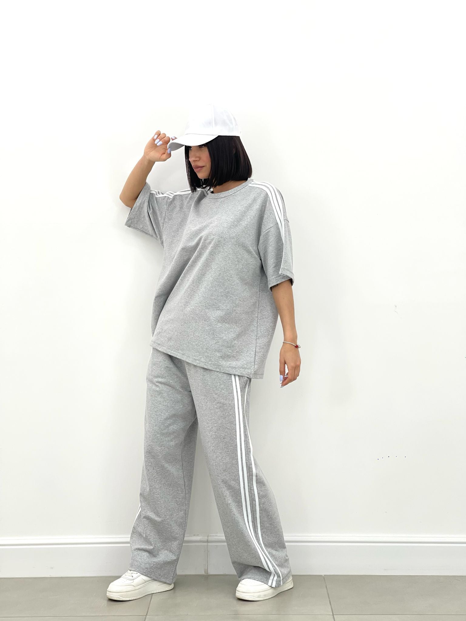 COORDINATO TUTA CON PROFILI LATERALI NEW SS25