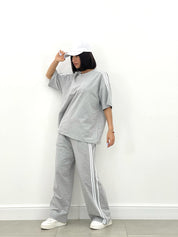 COORDINATO TUTA CON PROFILI LATERALI NEW SS25