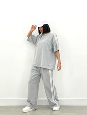 COORDINATO TUTA CON PROFILI LATERALI NEW SS25