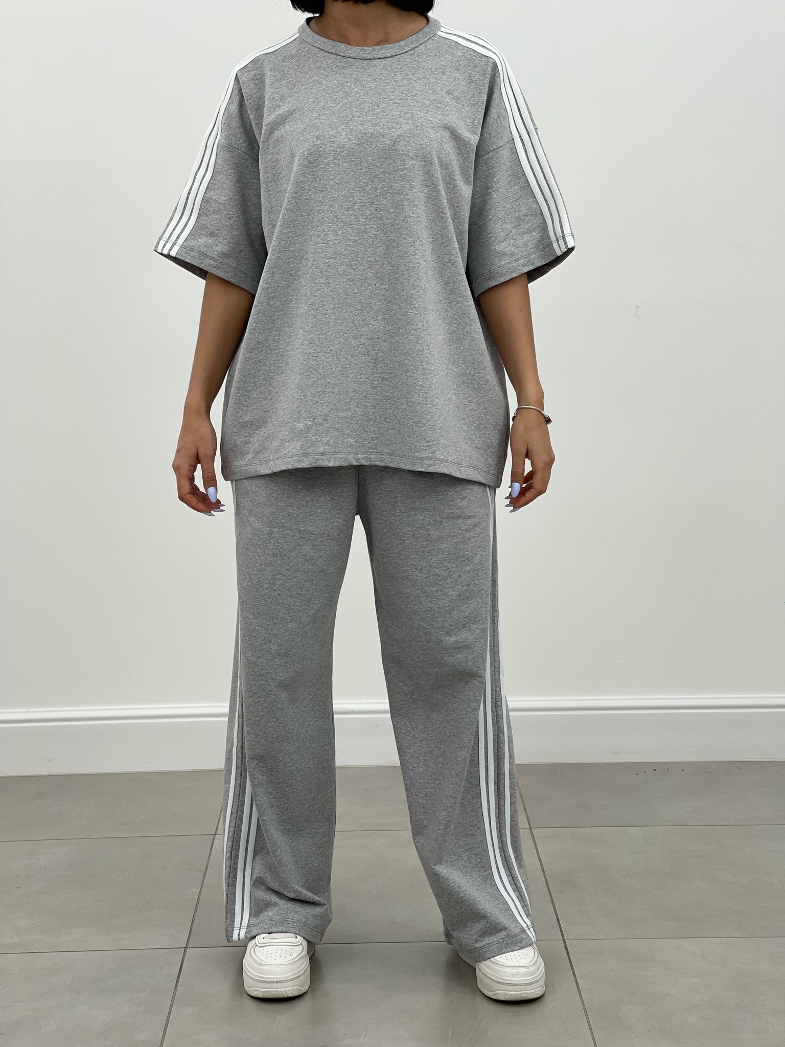 COORDINATO TUTA CON PROFILI LATERALI NEW SS25