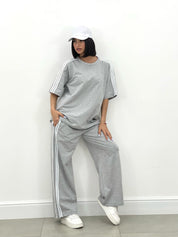 COORDINATO TUTA CON PROFILI LATERALI NEW SS25