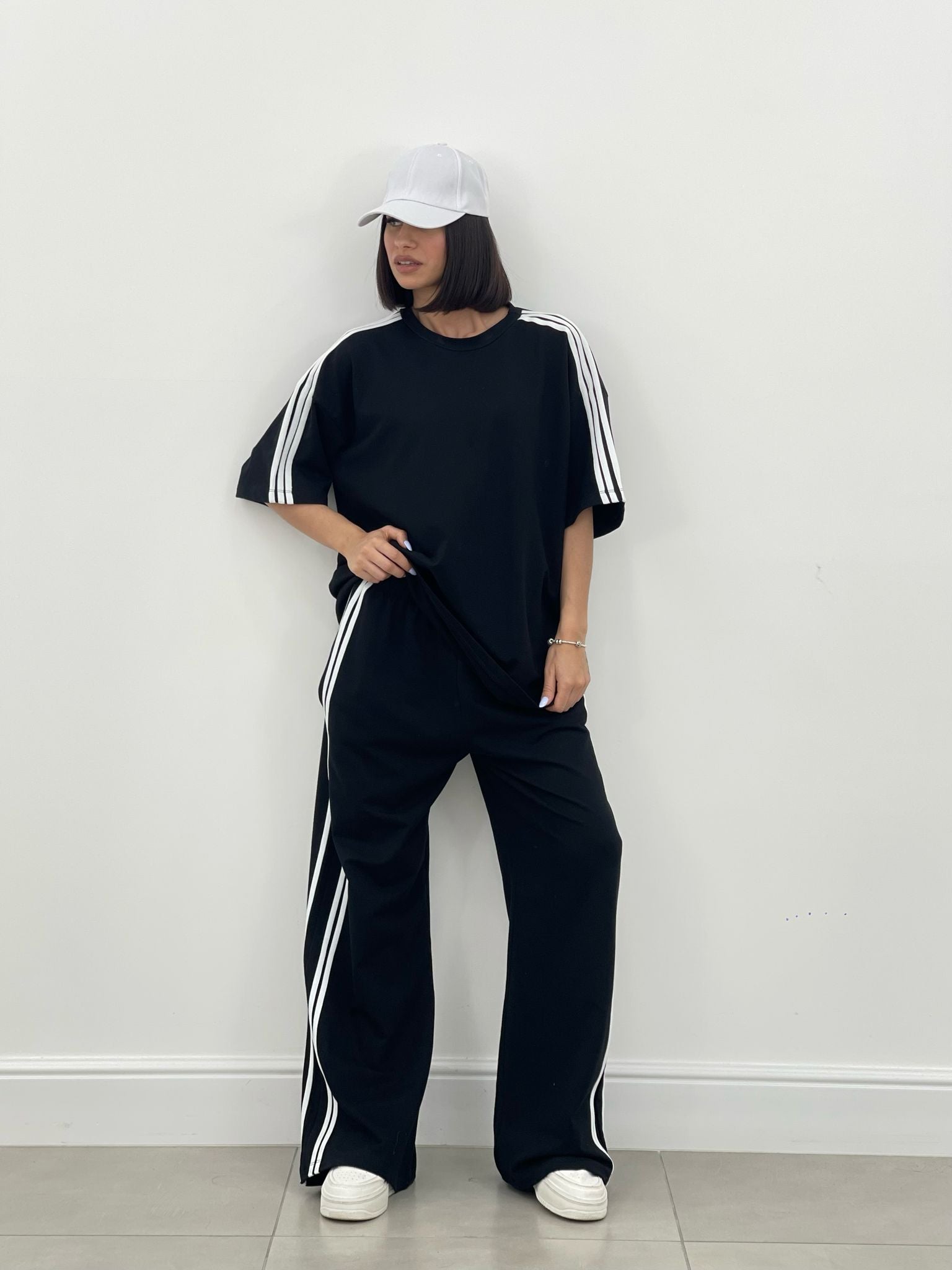 COORDINATO TUTA CON PROFILI LATERALI NEW SS25