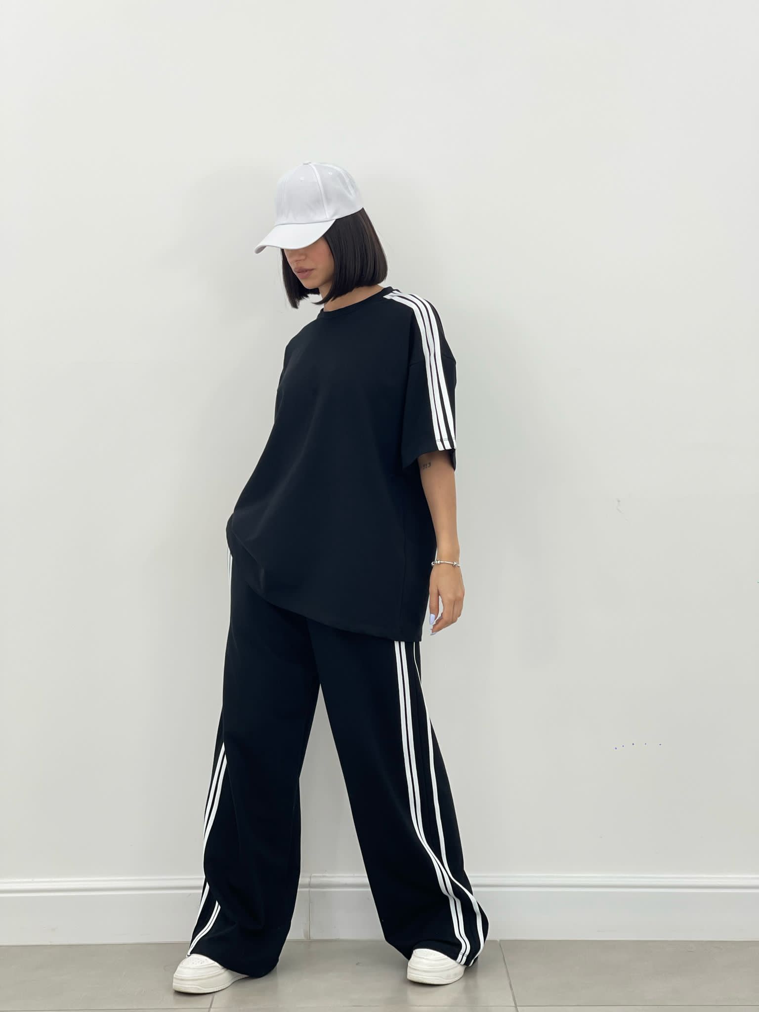 COORDINATO TUTA CON PROFILI LATERALI NEW SS25