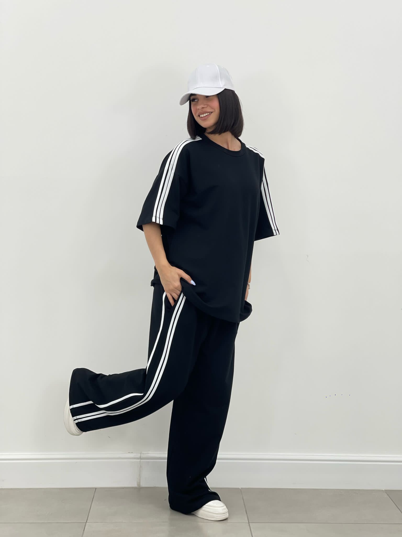 COORDINATO TUTA CON PROFILI LATERALI NEW SS25