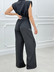 TUTA CON TASCONI E CINTURA NEW SS25