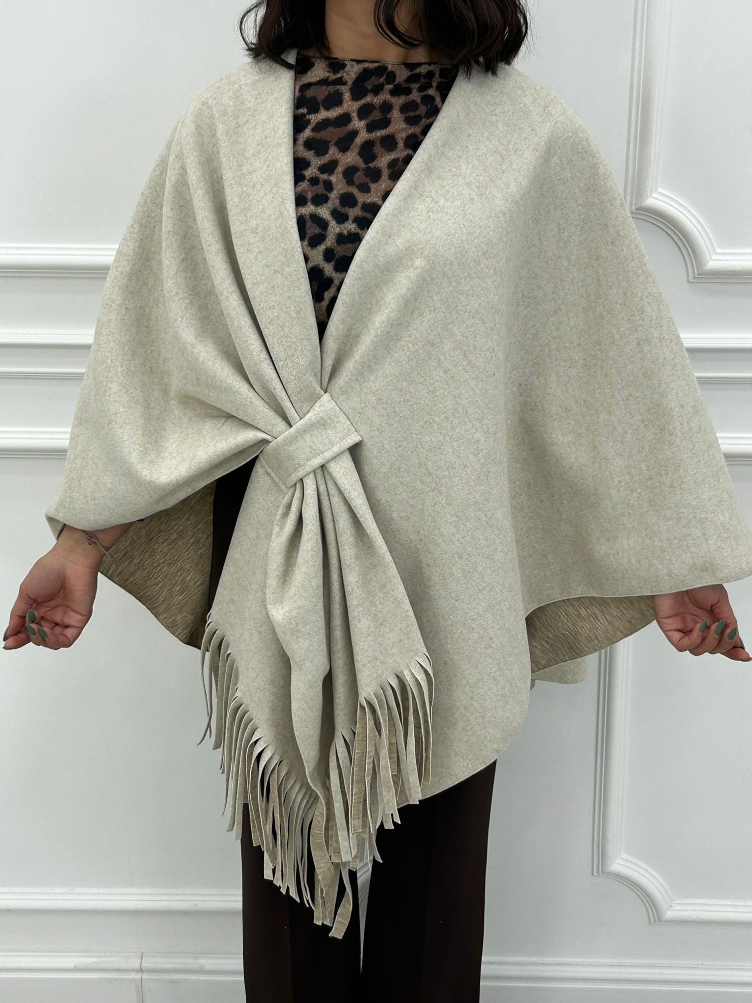PONCHO CON FRANGE NEW AI26