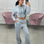 FELPA CROP CON ZIP E CAPPUCCIO
