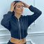 FELPA CROP CON ZIP E CAPPUCCIO