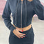 FELPA CROP CON ZIP E CAPPUCCIO