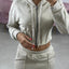 FELPA CROP CON ZIP E CAPPUCCIO