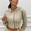 FELPA CROP CON ZIP E CAPPUCCIO
